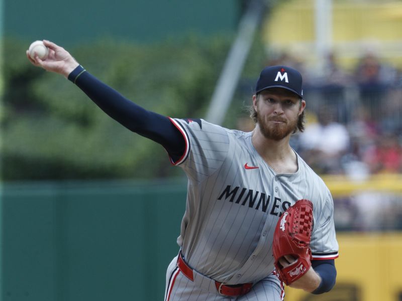 Jun 9, 2024; Pittsburgh, Pennsylvania, USA;  Minnesota Twins starting pitcher Bailey Ober (17) delivers a pitch against the Pittsburgh Pirates during the first inning at PNC Park. Mandatory Credit: Charles LeClaire-USA TODAY Sports