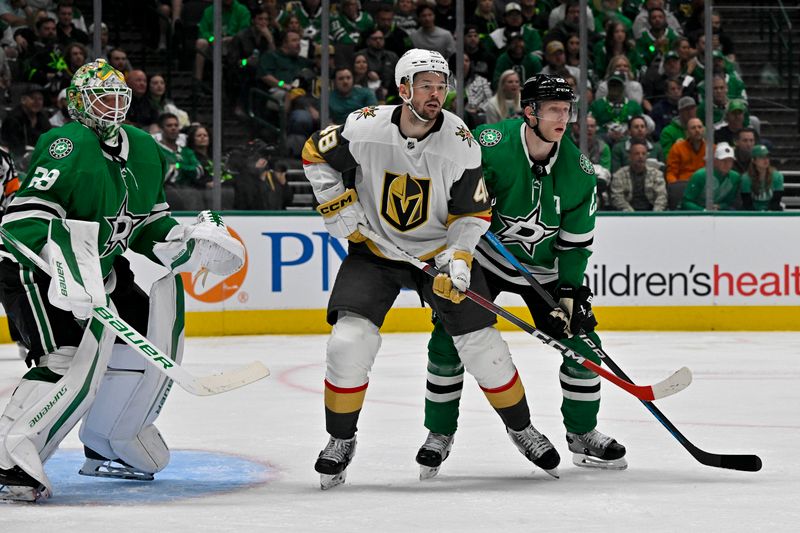 Apr 24, 2024; Dallas, Texas, USA; Dallas Stars goaltender Jake Oettinger (29) and defenseman Esa Lindell (23) and Vegas Golden Knights center Tomas Hertl (48) look for the puck in the Stars zone during the third period in game two of the first round of the 2024 Stanley Cup Playoffs at American Airlines Center. Mandatory Credit: Jerome Miron-USA TODAY Sports