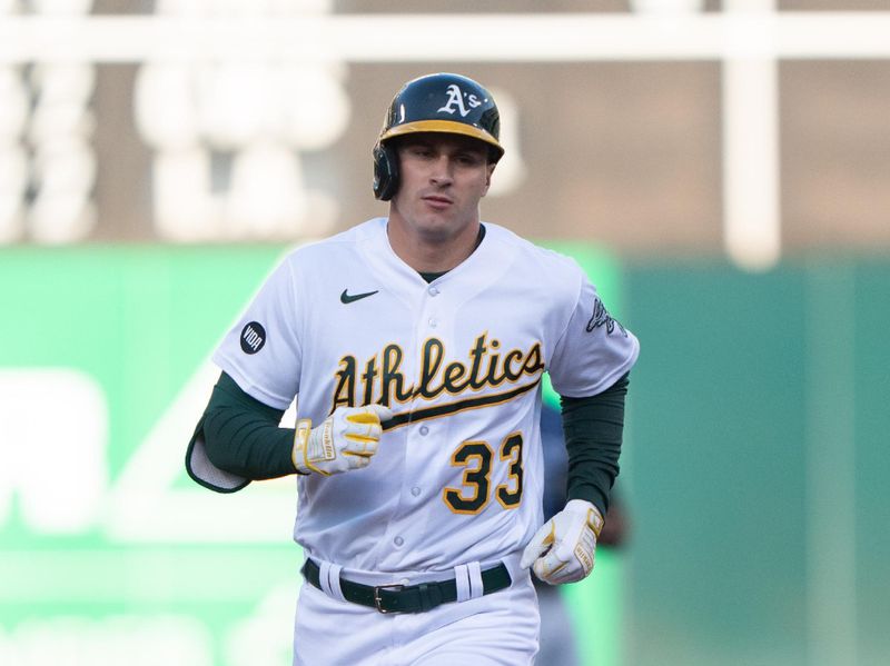 Jun 14, 2023; Oakland, California, USA;  Oakland Athletics left fielder JJ Bleday (33) runs the bases after hitting a three-run home run during the second inning against the Tampa Bay Rays at Oakland-Alameda County Coliseum. Mandatory Credit: Stan Szeto-USA TODAY Sports