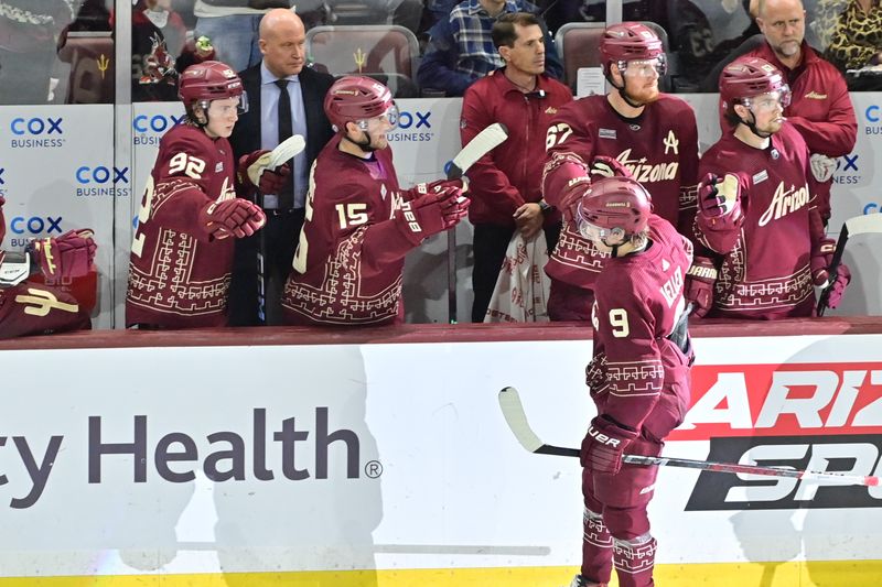 Mar 7, 2024; Tempe, Arizona, USA; Arizona Coyotes right wing Clayton Keller (9) celebrates after scoring a goal in the third period against the Minnesota Wild at Mullett Arena. Mandatory Credit: Matt Kartozian-USA TODAY Sports