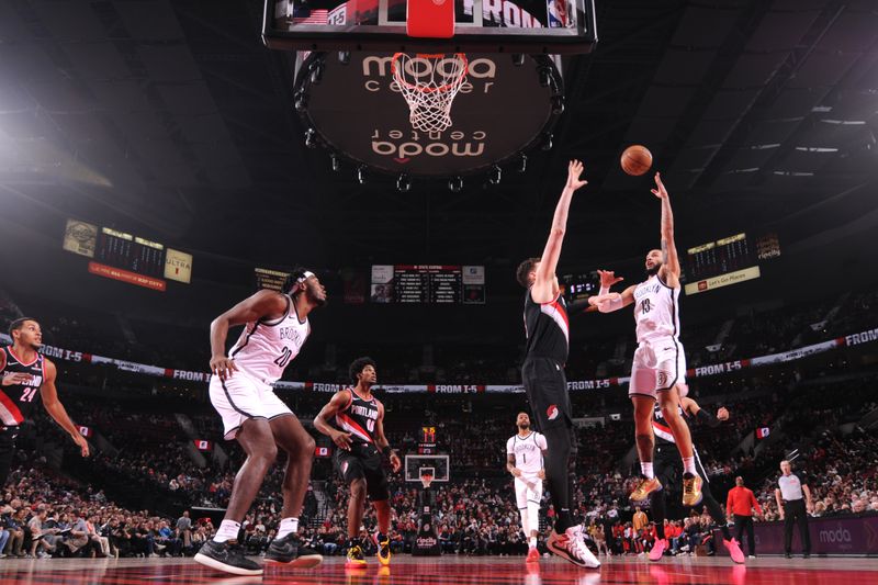 PORTLAND, OR - JANUARY 14: Tyrese Martin #13 of the Brooklyn Nets shoots the ball during the game against the Portland Trail Blazers on January 14, 2025 at the Moda Center Arena in Portland, Oregon. NOTE TO USER: User expressly acknowledges and agrees that, by downloading and or using this photograph, user is consenting to the terms and conditions of the Getty Images License Agreement. Mandatory Copyright Notice: Copyright 2025 NBAE (Photo by Cameron Browne/NBAE via Getty Images)