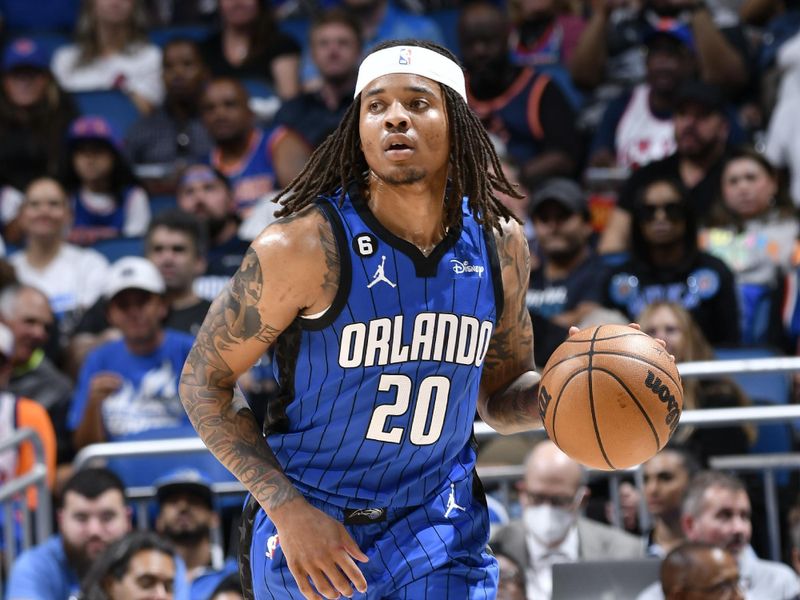 ORLANDO, FL - MARCH 23: Markelle Fultz #20 of the Orlando Magic dribbles the ball during the game against the New York Knicks on March 23, 2023 at Amway Center in Orlando, Florida. NOTE TO USER: User expressly acknowledges and agrees that, by downloading and or using this photograph, User is consenting to the terms and conditions of the Getty Images License Agreement. Mandatory Copyright Notice: Copyright 2023 NBAE (Photo by Fernando Medina/NBAE via Getty Images)