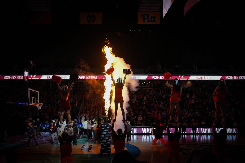 Mar 9, 2024; Greensboro, NC, USA; Virginia Tech Hokies cheerleaders entertain prior to a game against the Notre Dame Fighting Irish at Greensboro Coliseum. Mandatory Credit: David Yeazell-USA TODAY Sports