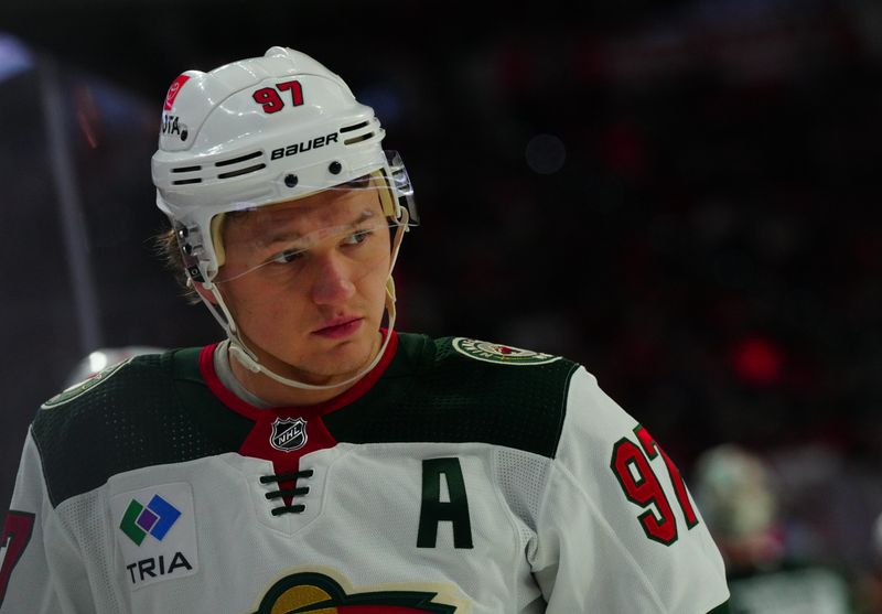 Jan 21, 2024; Raleigh, North Carolina, USA;  Minnesota Wild left wing Kirill Kaprizov (97) looks on against the Carolina Hurricanes during the second period at PNC Arena. Mandatory Credit: James Guillory-USA TODAY Sports