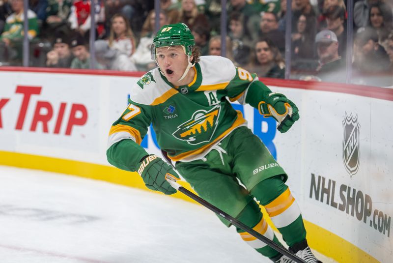 Nov 16, 2024; Saint Paul, Minnesota, USA; Minnesota Wild left wing Kirill Kaprizov (97) brings the puck up ice against the Dallas Stars in the third period at Xcel Energy Center. Mandatory Credit: Matt Blewett-Imagn Images