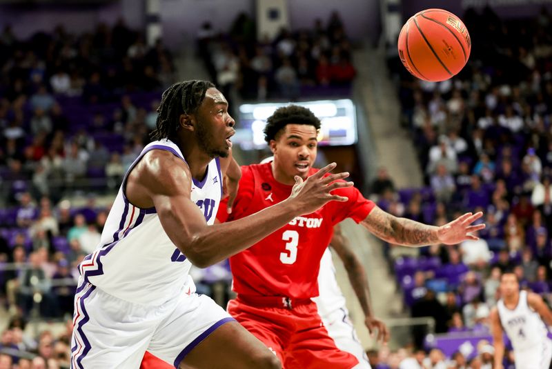 Jan 13, 2024; Fort Worth, Texas, USA;  TCU Horned Frogs center Ernest Udeh Jr. (8) and Houston Cougars guard Ramon Walker Jr. (3) go for a loose ball during the first half at Ed and Rae Schollmaier Arena. Mandatory Credit: Kevin Jairaj-USA TODAY Sports