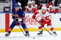 Red Wings' Alex DeBrincat Takes on Islanders in Pivotal NHL Clash