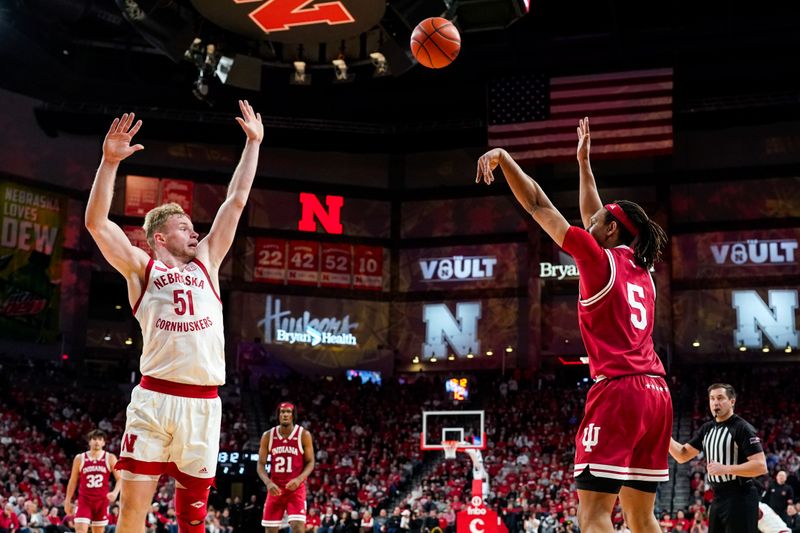 Jan 3, 2024; Lincoln, Nebraska, USA; Indiana Hoosiers forward Malik Reneau (5) shoots the ball against Nebraska Cornhuskers forward Rienk Mast (51) during the second half at Pinnacle Bank Arena. Mandatory Credit: Dylan Widger-USA TODAY Sports