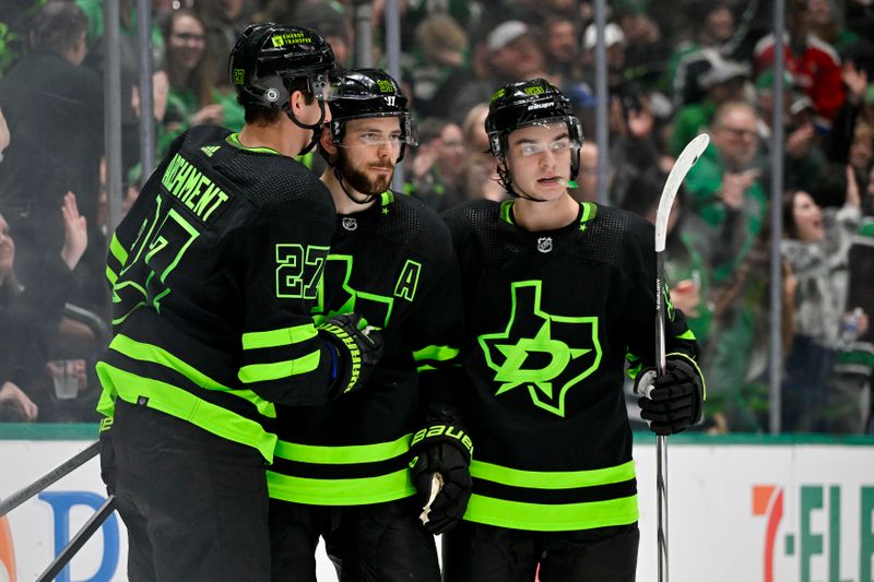 Jan 27, 2024; Dallas, Texas, USA; Dallas Stars left wing Mason Marchment (27) and center Tyler Seguin (91) and center Wyatt Johnston (53) celebrates a goal scored by Marchment against the Washington Capitals during the second period at the American Airlines Center. Mandatory Credit: Jerome Miron-USA TODAY Sports