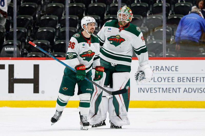 Feb 26, 2026; Denver, Colorado, USA; Minnesota Wild right wing Mats Zuccarello (36) and goaltender Jesper Wallstedt (30) after the game against the Colorado Avalanche at Ball Arena. Mandatory Credit: Isaiah J. Downing-Imagn Images