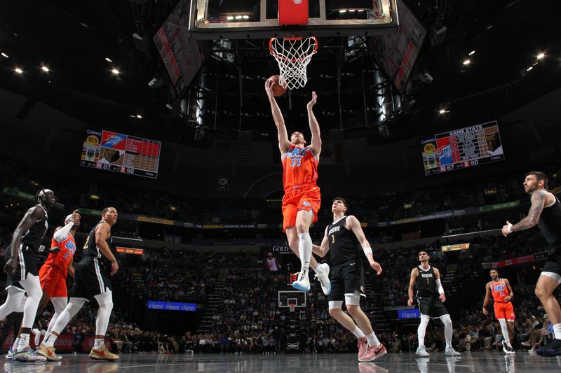 MEMPHIS, TN - MARCH 16:  Gordon Hayward #33 of the Oklahoma City Thunder drives to the basket during the game against the Memphis Grizzlies on March 16, 2024 at FedExForum in Memphis, Tennessee. NOTE TO USER: User expressly acknowledges and agrees that, by downloading and or using this photograph, User is consenting to the terms and conditions of the Getty Images License Agreement. Mandatory Copyright Notice: Copyright 2024 NBAE (Photo by Joe Murphy/NBAE via Getty Images)