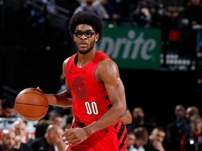 PORTLAND, OR - DECEMBER 26: Scoot Henderson #00 of the Portland Trail Blazers dribbles the ball during the game against the Sacramento Kings on December 26, 2023 at the Moda Center Arena in Portland, Oregon. NOTE TO USER: User expressly acknowledges and agrees that, by downloading and or using this photograph, user is consenting to the terms and conditions of the Getty Images License Agreement. Mandatory Copyright Notice: Copyright 2023 NBAE (Photo by Cameron Browne/NBAE via Getty Images)