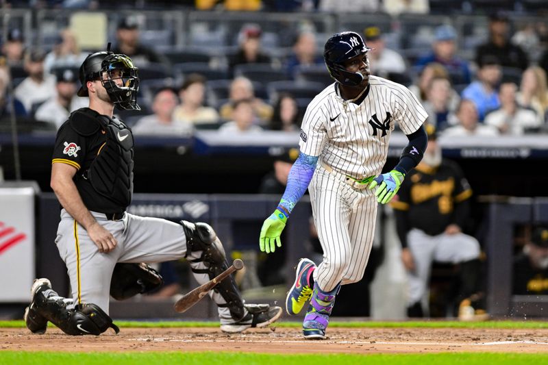 Sep 27, 2024; Bronx, New York, USA; New York Yankees third baseman Jazz Chisholm Jr. (13) hits a double against the Pittsburgh Pirates during the first inning at Yankee Stadium. Mandatory Credit: John Jones-Imagn Images