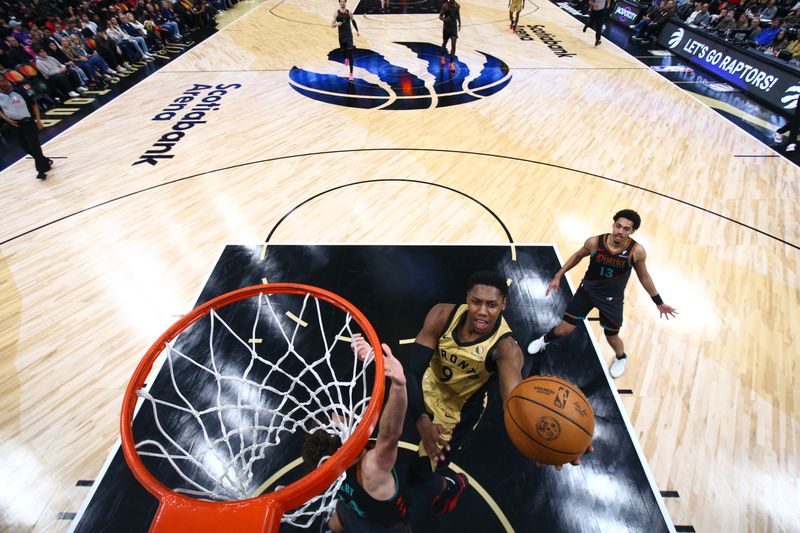 TORONTO, CANADA - APRIL 7: RJ Barrett #9 of the Toronto Raptors drives to the basket during the game against the Washington Wizards on April 7, 2024 at the Scotiabank Arena in Toronto, Ontario, Canada.  NOTE TO USER: User expressly acknowledges and agrees that, by downloading and or using this Photograph, user is consenting to the terms and conditions of the Getty Images License Agreement.  Mandatory Copyright Notice: Copyright 2024 NBAE (Photo by Vaughn Ridley/NBAE via Getty Images)