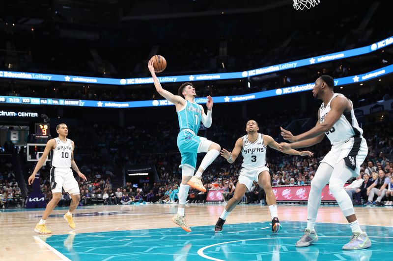 CHARLOTTE, NC - FEBRUARY 15: LaMelo Ball #1 of the Charlotte Hornets drives to the basket during the game against the San Antonio Spurs on February 15, 2023 at Spectrum Center in Charlotte, North Carolina. NOTE TO USER: User expressly acknowledges and agrees that, by downloading and or using this photograph, User is consenting to the terms and conditions of the Getty Images License Agreement.  Mandatory Copyright Notice:  Copyright 2023 NBAE (Photo by Brock Williams-Smith/NBAE via Getty Images)