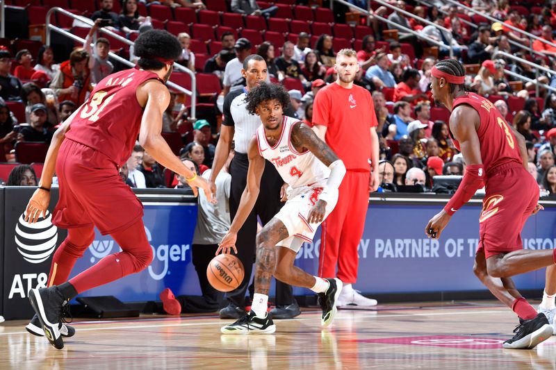 HOUSTON, TX - MARCH 16: Jalen Green #4 of the Houston Rockets dribbles the ball during the game against the Cleveland Cavaliers  on March 16, 2023 at the Toyota Center in Houston, Texas. NOTE TO USER: User expressly acknowledges and agrees that, by downloading and or using this photograph, User is consenting to the terms and conditions of the Getty Images License Agreement. Mandatory Copyright Notice: Copyright 2024 NBAE (Photo by Logan Riely/NBAE via Getty Images)