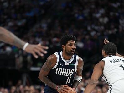 DALLAS, TX - OCTOBER 27: Kyrie Irving #11 of the Dallas Mavericks looks to pass the ball during the game against the Brooklyn Nets on October 27, 2023 at the American Airlines Center in Dallas, Texas. NOTE TO USER: User expressly acknowledges and agrees that, by downloading and or using this photograph, User is consenting to the terms and conditions of the Getty Images License Agreement. Mandatory Copyright Notice: Copyright 2023 NBAE (Photo by Glenn James/NBAE via Getty Images)