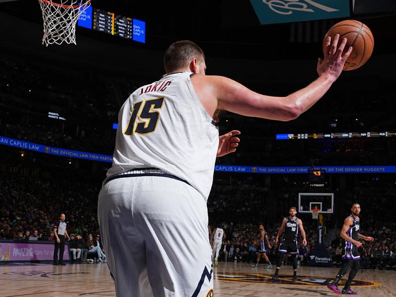 DENVER, CO - FEBRUARY 28: Nikola Jokic #15 of the Denver Nuggets passes the ball during the game against the Sacramento Kings on February 28, 2024 at the Ball Arena in Denver, Colorado. NOTE TO USER: User expressly acknowledges and agrees that, by downloading and/or using this Photograph, user is consenting to the terms and conditions of the Getty Images License Agreement. Mandatory Copyright Notice: Copyright 2024 NBAE (Photo by Garrett Ellwood/NBAE via Getty Images)