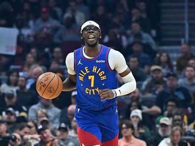 CLEVELAND, OHIO - NOVEMBER 19: Reggie Jackson #7 of the Denver Nuggets brings the ball up court during the first quarter against the Cleveland Cavaliers at Rocket Mortgage Fieldhouse on November 19, 2023 in Cleveland, Ohio. NOTE TO USER: User expressly acknowledges and agrees that, by downloading and or using this photograph, User is consenting to the terms and conditions of the Getty Images License Agreement. (Photo by Jason Miller/Getty Images)