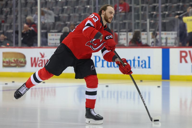 Oct 22, 2024; Newark, New Jersey, USA; New Jersey Devils defenseman Daniil Misyul (93) warms up before making his NHL debut against the Tampa Bay Lightning at Prudential Center. Mandatory Credit: Ed Mulholland-Imagn Images