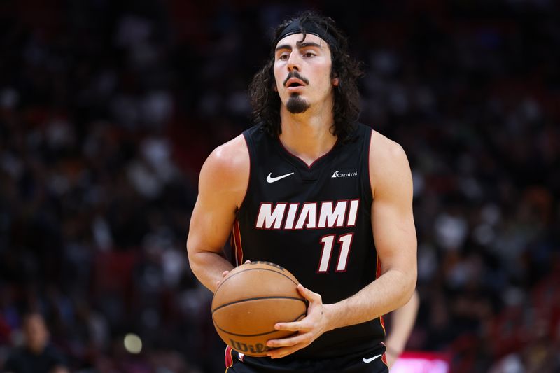 MIAMI, FLORIDA - FEBRUARY 06: Jaime Jaquez Jr. #11 of the Miami Heat shoots a free throw against the Orlando Magic during the third quarter of the game at Kaseya Center on February 06, 2024 in Miami, Florida. NOTE TO USER: User expressly acknowledges and agrees that, by downloading and or using this photograph, User is consenting to the terms and conditions of the Getty Images License Agreement. (Photo by Megan Briggs/Getty Images)