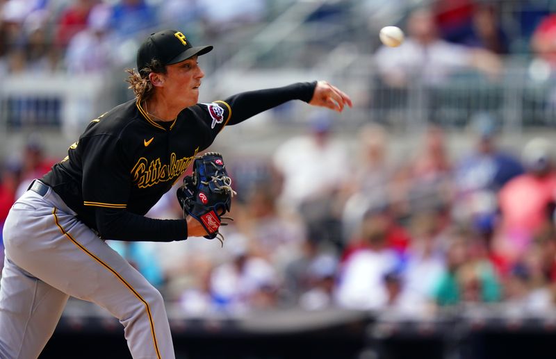 Sep 10, 2023; Cumberland, Georgia, USA; Pittsburgh Pirates relief pitcher Ryan Borucki (43) pitching against the Atlanta Braves during the sixth inning at Truist Park. Mandatory Credit: John David Mercer-USA TODAY Sports