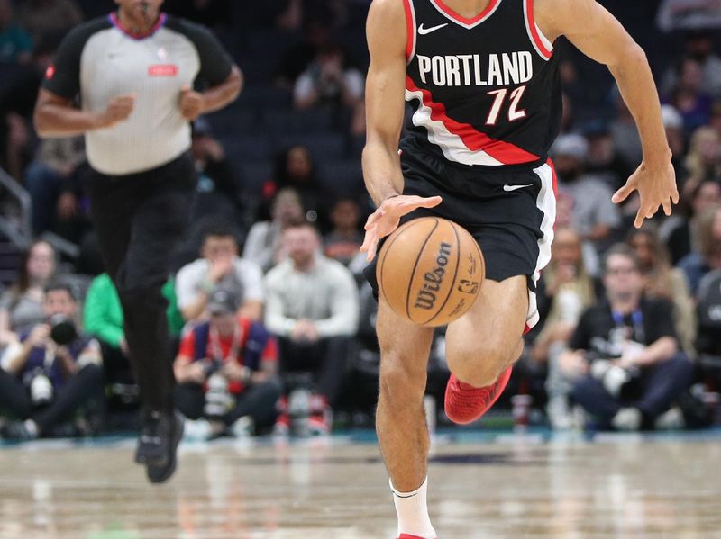 CHARLOTTE, NC - APRIL 3:  Rayan Rupert #72 of the Portland Trail Blazers handles the ball during the game against the Charlotte Hornets on April 3, 2024 at Spectrum Center in Charlotte, North Carolina. NOTE TO USER: User expressly acknowledges and agrees that, by downloading and or using this photograph, User is consenting to the terms and conditions of the Getty Images License Agreement.  Mandatory Copyright Notice:  Copyright 2024 NBAE (Photo by Brock Williams-Smith/NBAE via Getty Images)