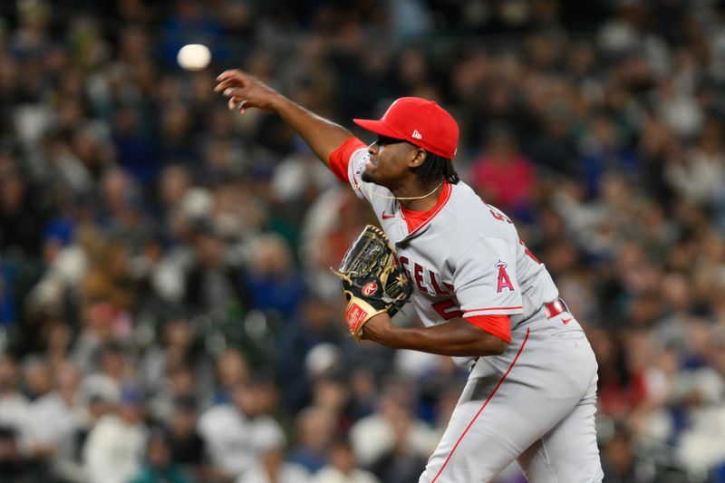 Sep 11, 2023; Seattle, Washington, USA; Los Angeles Angels relief pitcher Jose Soriano (59) pitches to the Seattle Mariners during the eighth inning at T-Mobile Park. Mandatory Credit: Steven Bisig-USA TODAY Sports