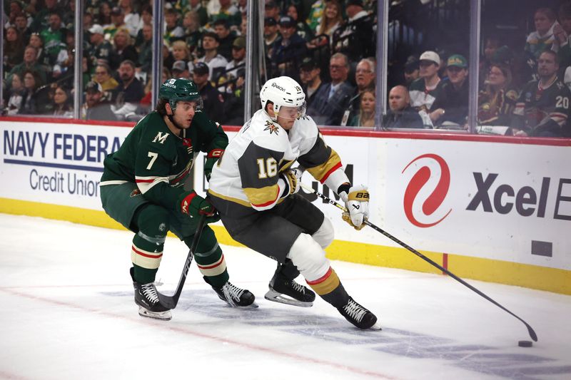 Apr 26, 2025; Saint Paul, Minnesota, USA; Minnesota Wild defenseman Brock Faber (7) chases Vegas Golden Knights left wing Pavel Dorofeyev (16) during the first period in game four of the first round of the 2025 Stanley Cup Playoffs at Xcel Energy Center. Mandatory Credit: Bruce Fedyck-Imagn Images