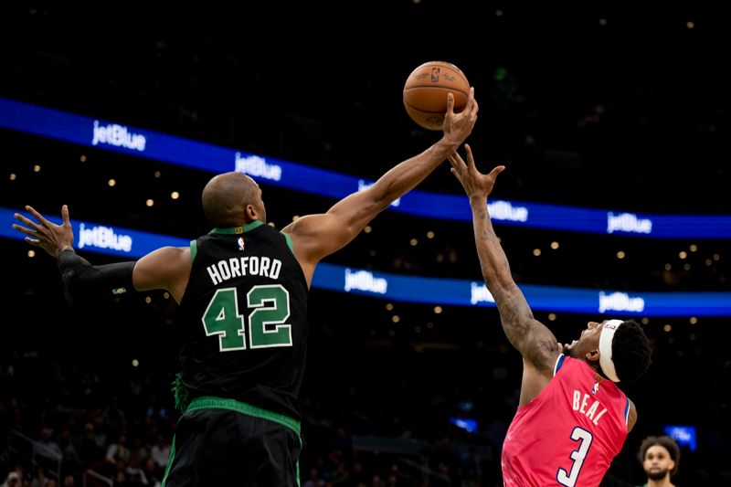 BOSTON, MA - NOVEMBER 27: Al Horford #42 of the Boston Celtics gains possession of the ball from Bradley Beal #3 of the Washington Wizards during the second half of a game at TD Garden on November 27, 2022 in Boston, Massachusetts. NOTE TO USER: User expressly acknowledges and agrees that, by downloading and or using this photograph, User is consenting to the terms and conditions of the Getty Images License Agreement. (Photo by Maddie Malhotra/Getty Images)