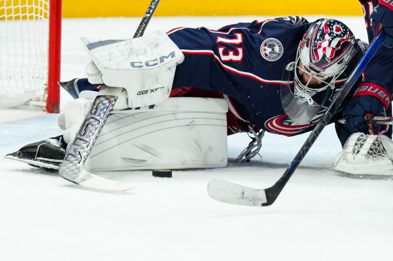 Dec 18, 2025; Columbus, Ohio, USA;  Columbus Blue Jackets goaltender Jet Greaves (73) makes a save in net against the Minnesota Wild in the second period at Nationwide Arena. Mandatory Credit: Aaron Doster-Imagn Images