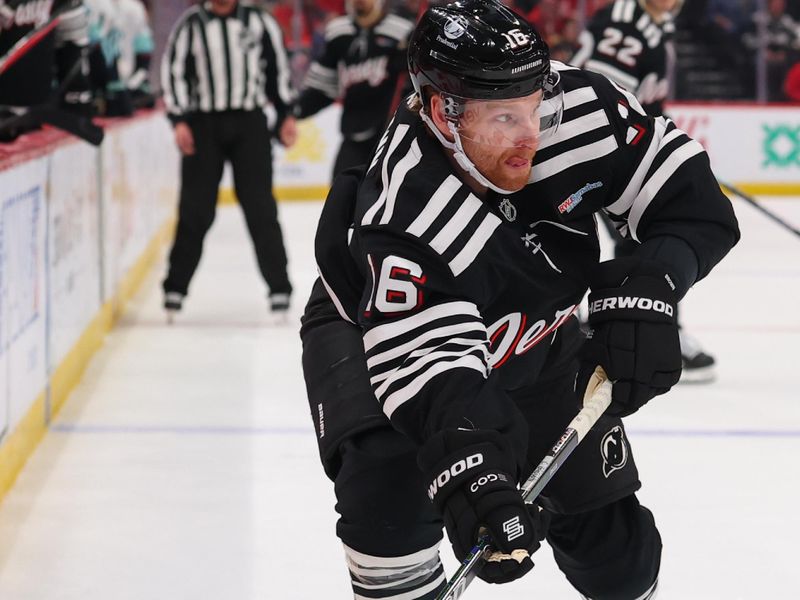 Jan 14, 2026; Newark, New Jersey, USA; New Jersey Devils right wing Connor Brown (16) shoots the puck along the boards against the Seattle Kraken during the second period at Prudential Center. Mandatory Credit: Ed Mulholland-Imagn Images
