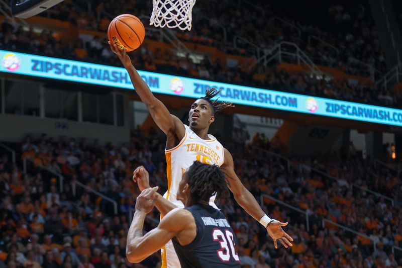 Feb 25, 2023; Knoxville, Tennessee, USA; Tennessee Volunteers guard Jahmai Mashack (15) goes to the basket against South Carolina Gamecocks forward Daniel Hankins-Sanford (30) during the first half at Thompson-Boling Arena. Mandatory Credit: Randy Sartin-USA TODAY Sports