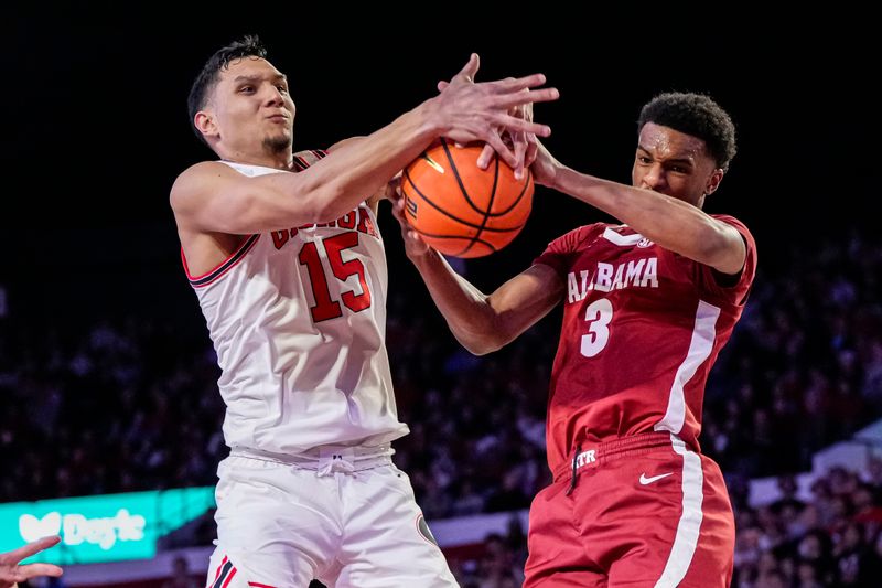 Jan 31, 2024; Athens, Georgia, USA; Georgia Bulldogs guard RJ Melendez (15) and Alabama Crimson Tide guard Rylan Griffen (3) fight for a rebound during the second half at Stegeman Coliseum. Mandatory Credit: Dale Zanine-USA TODAY Sports