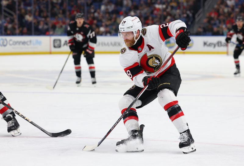 Jan 11, 2024; Buffalo, New York, USA;  Ottawa Senators right wing Claude Giroux (28) looks to make a pass during the second period against the Buffalo Sabres at KeyBank Center. Mandatory Credit: Timothy T. Ludwig-USA TODAY Sports