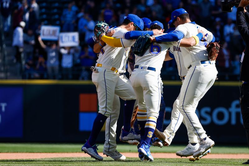 Oct 1, 2023; Seattle, Washington, USA; Seattle Mariners players celebrate following a 1-0 victory against the Texas Rangers at T-Mobile Park. Mandatory Credit: Joe Nicholson-USA TODAY Sports