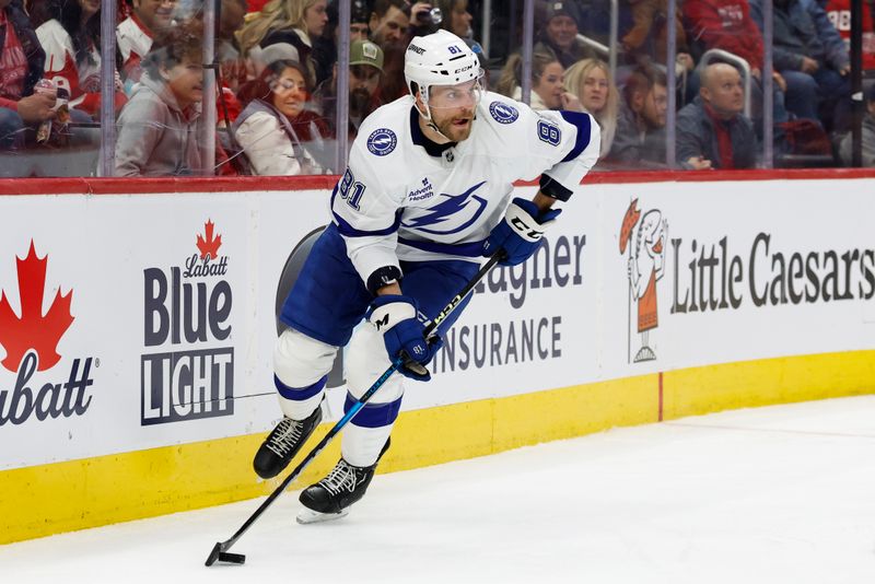 Jan 25, 2025; Detroit, Michigan, USA;  Tampa Bay Lightning defenseman Erik Cernak (81) skates with the puck in the second period against the Detroit Red Wings at Little Caesars Arena. Mandatory Credit: Rick Osentoski-Imagn Images