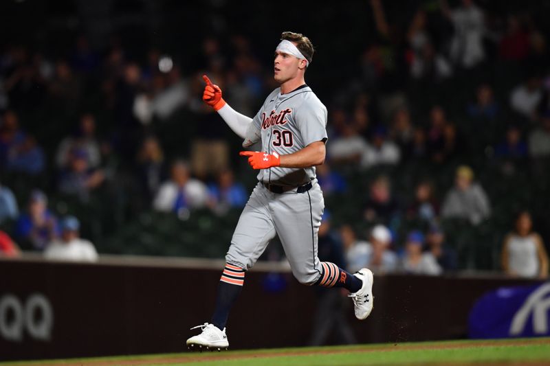Aug 21, 2024; Chicago, Illinois, USA; Detroit Tigers right fielder Kerry Carpenter (30) rounds the bases after hitting a three-run home run during the ninth inning against the Chicago Cubs at Wrigley Field. Mandatory Credit: Patrick Gorski-USA TODAY Sports