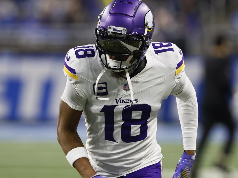 Minnesota Vikings wide receiver Justin Jefferson (18) runs a route while warming up for an NFL football game against the Detroit Lions Sunday, Jan. 7, 2024, in Detroit. (AP Photo/Duane Burleson)