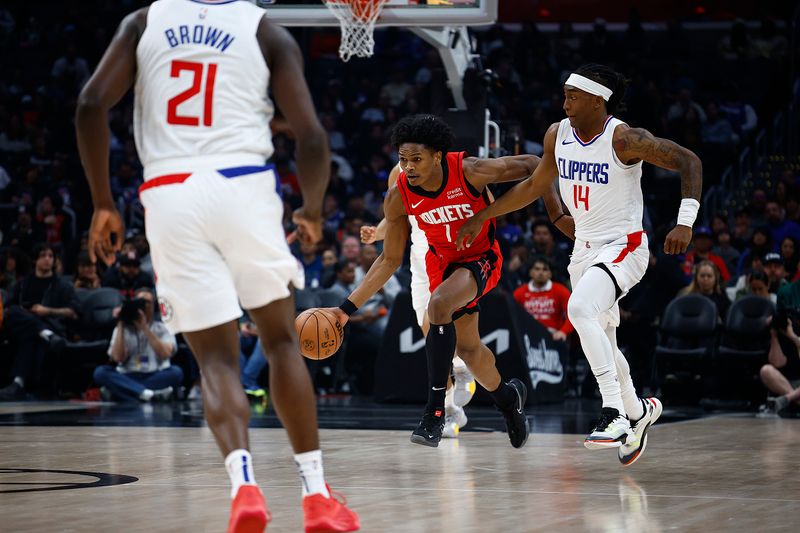 LOS ANGELES, CALIFORNIA - APRIL 14:  Amen Thompson #1 of the Houston Rockets in the first half at Crypto.com Arena on April 14, 2024 in Los Angeles, California.  NOTE TO USER: User expressly acknowledges and agrees that, by downloading and/or using this photograph, user is consenting to the terms and conditions of the Getty Images License Agreement.  (Photo by Ronald Martinez/Getty Images)