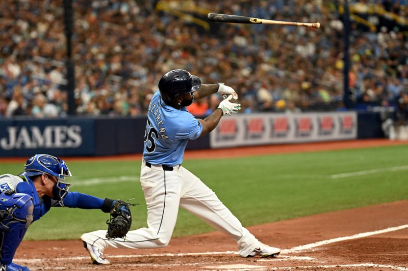 May 26, 2024; St. Petersburg, Florida, USA; Tampa Bay Rays left fielder Randy Arozarena (56) loses his bat on a swing and miss in the fifth inning against the Kansas City Royals at Tropicana Field. Mandatory Credit: Jonathan Dyer-USA TODAY Sports