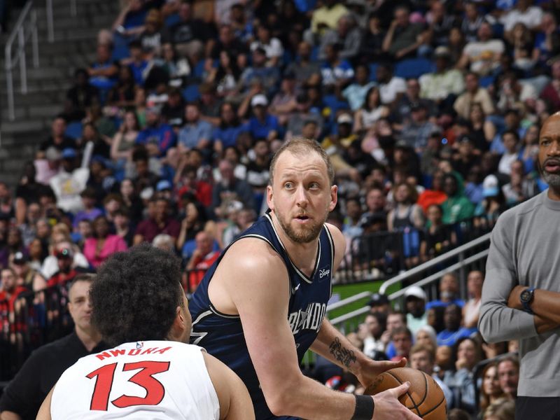 ORLANDO, FL - MARCH 17: Joe Ingles #7 of the Orlando Magic looks to pass the ball during the game against the Toronto Raptors on March 17, 2024 at the Kia Center in Orlando, Florida. NOTE TO USER: User expressly acknowledges and agrees that, by downloading and or using this photograph, User is consenting to the terms and conditions of the Getty Images License Agreement. Mandatory Copyright Notice: Copyright 2024 NBAE (Photo by Fernando Medina/NBAE via Getty Images)