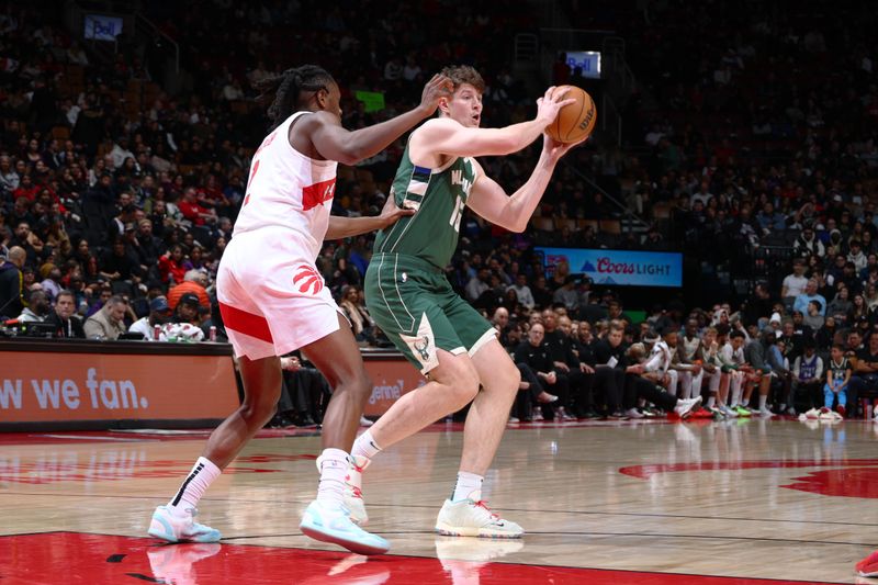 TORONTO, CANADA - JANUARY 6: Liam Robbins #15 of the Milwaukee Bucks looks to pass the ball during the game against the Toronto Raptors on January 6, 2025 at the Scotiabank Arena in Toronto, Ontario, Canada.  NOTE TO USER: User expressly acknowledges and agrees that, by downloading and or using this Photograph, user is consenting to the terms and conditions of the Getty Images License Agreement.  Mandatory Copyright Notice: Copyright 2025 NBAE (Photo by Vaughn Ridley/NBAE via Getty Images)