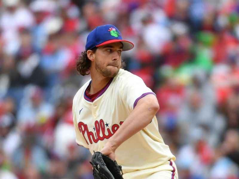 Apr 21, 2024; Philadelphia, Pennsylvania, USA; Philadelphia Phillies pitcher Aaron Nola (27) throws a pitch during the first inning against the Chicago White Sox at Citizens Bank Park. Mandatory Credit: Eric Hartline-USA TODAY Sports