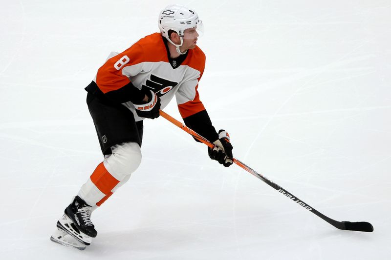 Mar 20, 2025; Washington, District of Columbia, USA; Philadelphia Flyers defenseman Cam York (8) controls the puck during the third period against the Washington Capitals at Capital One Arena. Mandatory Credit: Daniel Kucin Jr.-Imagn Images