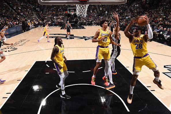 SAN ANTONIO, TX - DECEMBER 13: Rui Hachimura #28 of the Los Angeles Lakers rebounds the ball during the game against the San Antonio Spurs on December 13, 2023 at the Frost Bank Center in San Antonio, Texas. NOTE TO USER: User expressly acknowledges and agrees that, by downloading and or using this photograph, user is consenting to the terms and conditions of the Getty Images License Agreement. Mandatory Copyright Notice: Copyright 2023 NBAE (Photos by Andrew D. Bernstein/NBAE via Getty Images)