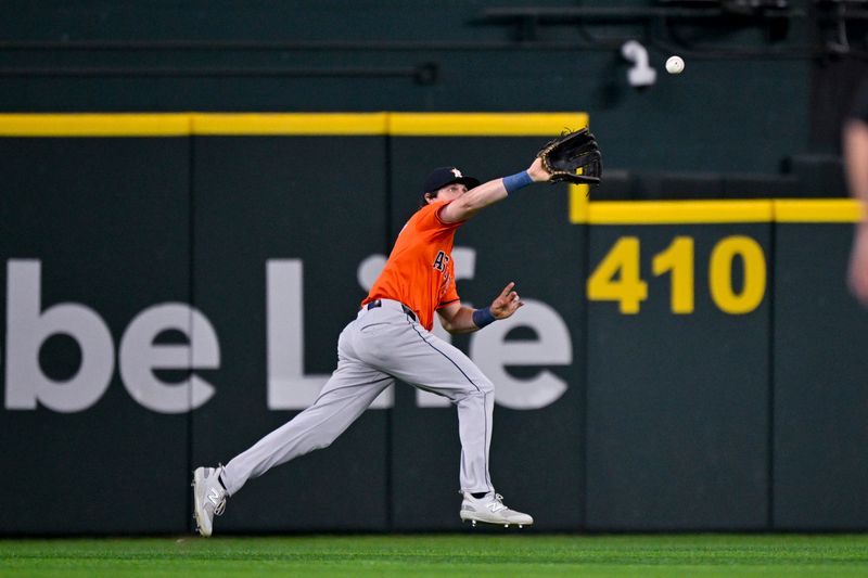 Aug 7, 2024; Arlington, Texas, USA;  Houston Astros center fielder Jake Meyers (6) catches a fly ball hit by Texas Rangers right fielder Adolis Garcia (not pictured) during the fifth inning at Globe Life Field. Mandatory Credit: Jerome Miron-USA TODAY Sports