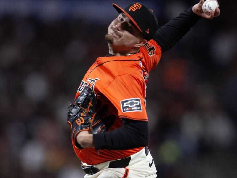 Jun 14, 2024; San Francisco, California, USA; San Francisco Giants pitcher Luke Jackson (77) delivers a pitch against the Los Angeles Angels during the fifth inning at Oracle Park. Mandatory Credit: D. Ross Cameron-USA TODAY Sports