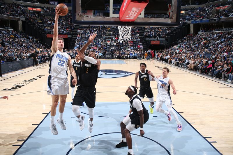 MEMPHIS, TN - JANUARY 26:  Franz Wagner #22 of the Orlando Magic drives to the basket during the game against the Memphis Grizzlies on January 26, 2024 at FedExForum in Memphis, Tennessee. NOTE TO USER: User expressly acknowledges and agrees that, by downloading and or using this photograph, User is consenting to the terms and conditions of the Getty Images License Agreement. Mandatory Copyright Notice: Copyright 2024 NBAE (Photo by Joe Murphy/NBAE via Getty Images)