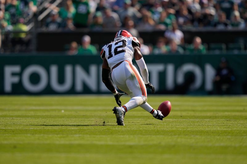 Cleveland Browns safety Rodney McLeod Jr. (12) recovers a blocked field goal attempt during the first half of an NFL football game against the Philadelphia Eagles on Sunday, Oct. 13, 2024, in Philadelphia. (AP Photo/Matt Slocum)